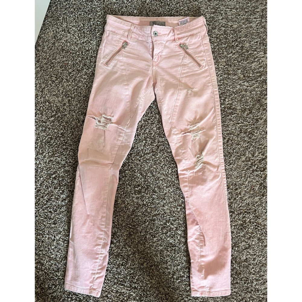 Pink ripped jeans from Guess
